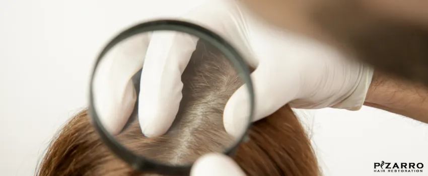 PHR - Doctor examining woman's hair