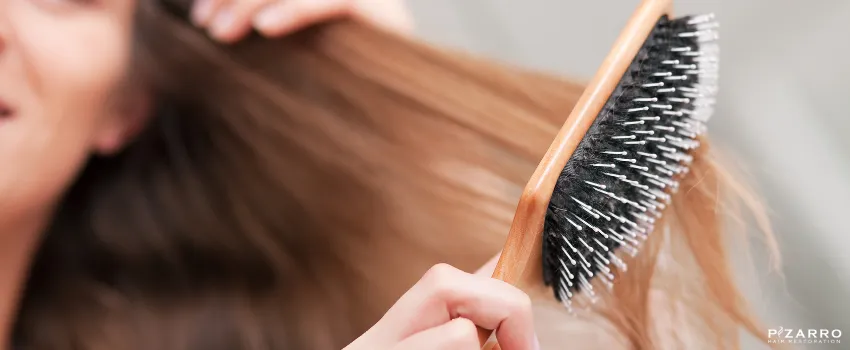 PHR - Woman brushing her hair